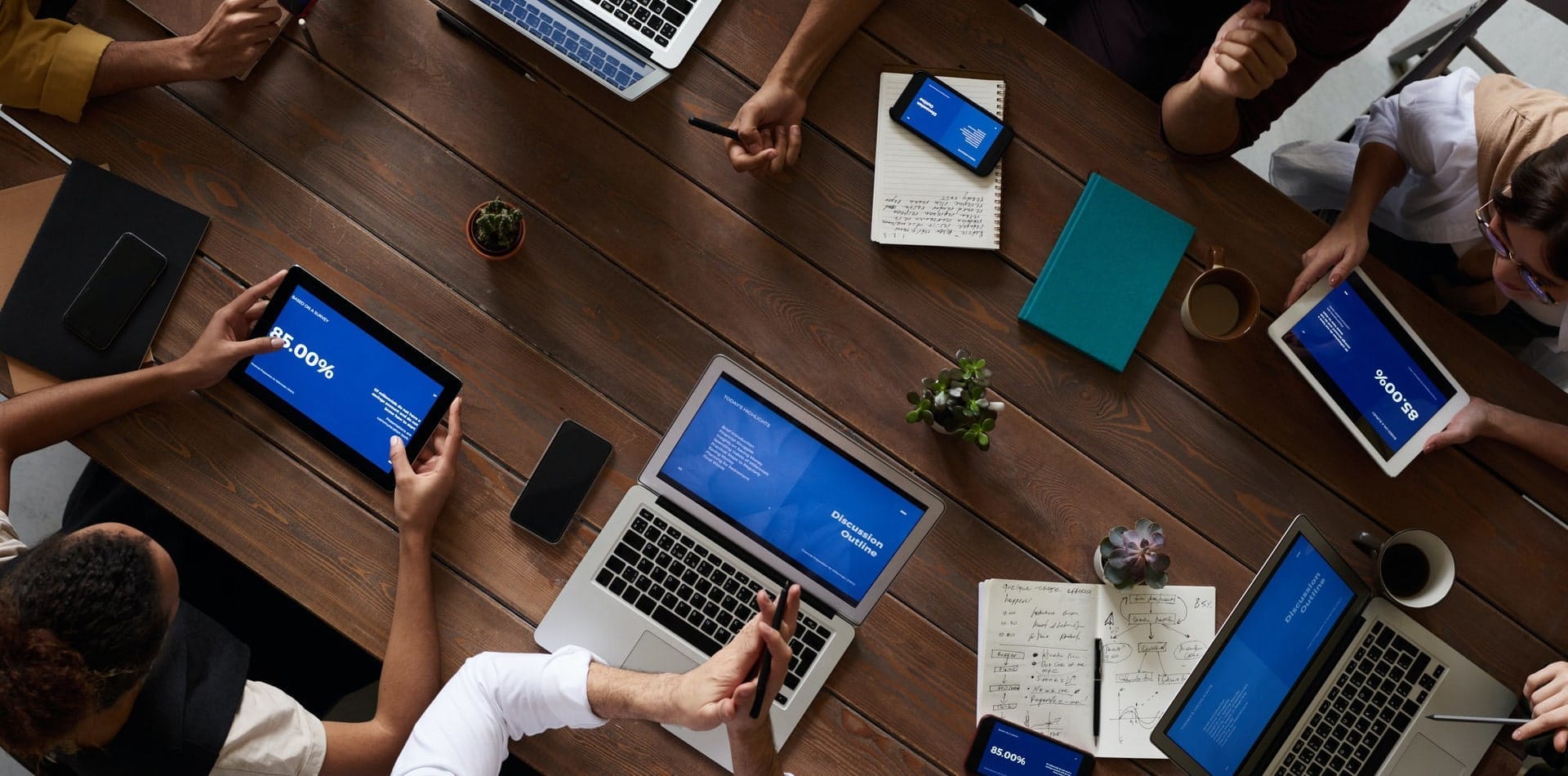 Staff working on laptops connected to a fast office network